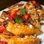 Crunchy Battered French Toast - Thick sliced Texas toast, battered in crunchy cereal with
fresh berry sauce, candied walnuts, brown sugar butter, bourbon maple syrup