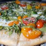 Vegetarian Pie - Thin crusted white pie with broccolini, tri-colored tomatoes, fresh mozzarella & pecorino romano