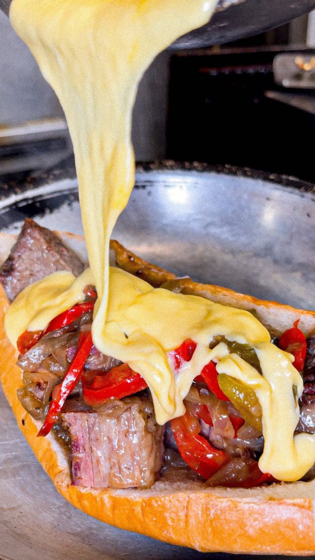 🔥 Behold the seductive cheese pour on our Smoked Burnt Ends Brisket Cheesesteak! 🧀💕

🥩 House-smoked burnt end brisket, sautéed peppers, onions, bourbon BBQ sauce, and the irresistible Cooper Sharp American cheese sauce, all nestled in a toasted long roll! 🤤

😍 Witness the enchanting cheese cascade that’ll make your mouth water at Freddy J’s! 🌊🧀

📍 Hurry in for this delectable indulgence - available in limited quantities until sold out! 😋🏃‍♂️💨